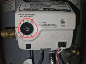 a water heater getting prepped to turn off